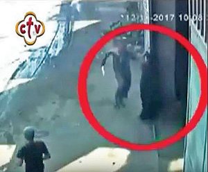 Captured by security camera before other citizens caught him, Bishop Samaan Shehata’s assailant arrives at a warehouse in pursuit of the injured Shehata, weapon in hand Credit: Morning Star News