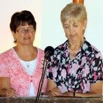 Jan praying with Mintie Nel, her friend and ministry partner