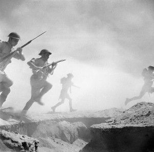 24 October 1942 - British infantry advance through the dust and smoke of the battle Source Wiki Commons