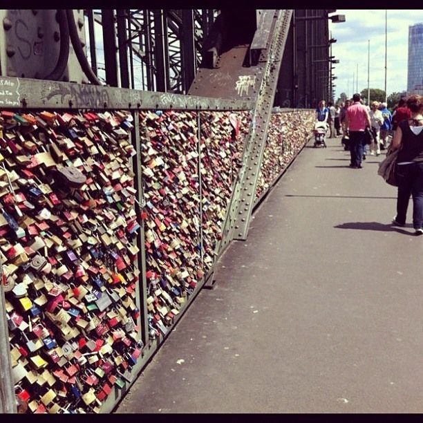 Love-locked: Cologne’s Hohenzollern bridge has become the place where couples leave padlocks symbolising their devotion Love-locked: Cologne’s Hohenzollern bridge has become the place where couples leave padlocks symbolising their devotion