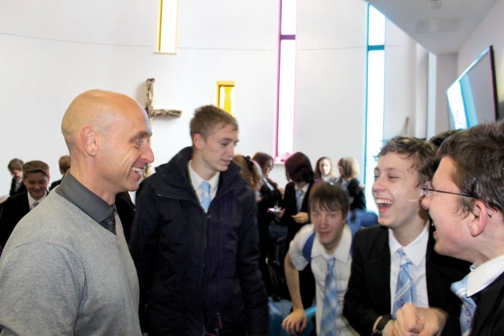 TLA students share a joke with Paul Sanderson