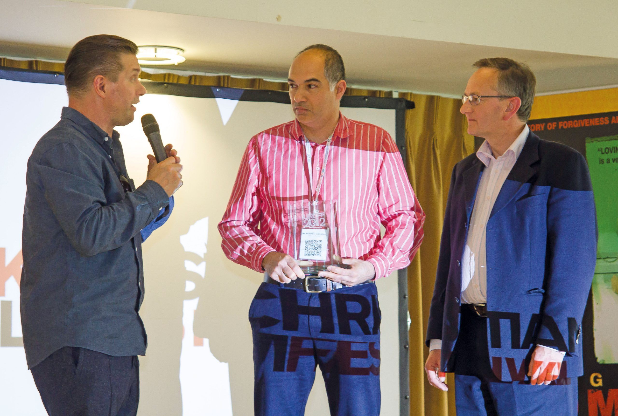 Release Head of Communications Matt Constant (centre) picks up award from actor Stephen Baldwin (left). Andrew Boyd is on the right. Picture- Andrew Wilson