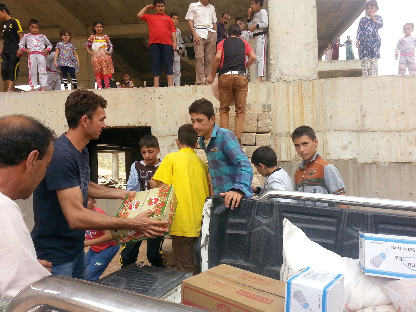 Families are trying to make new homes on a building site in Irbil