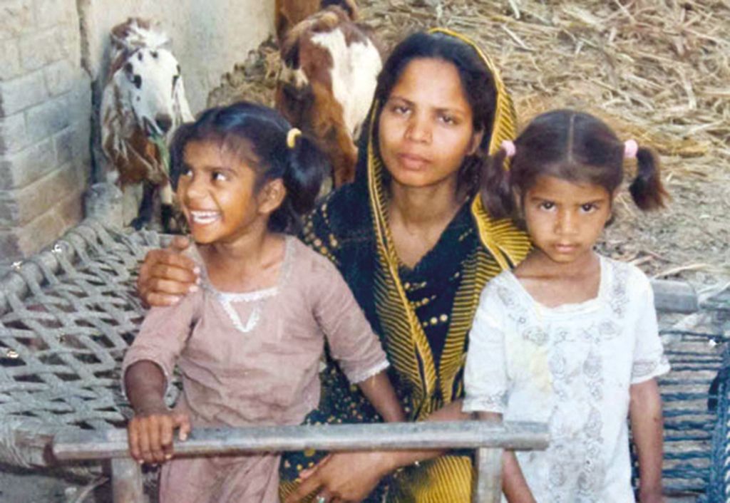Asia Bibi with her two daughters. She has been on death row for five years