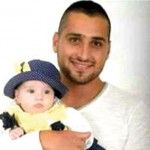 Zidan, the murdered Druze policeman, with his baby son