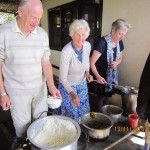 Ian, Pauline and Jenny serving lunch to patients