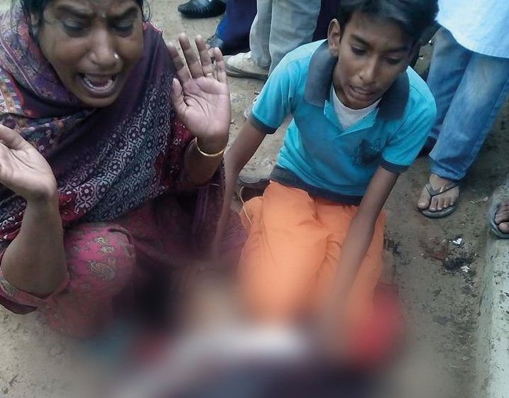 Wailing from a mother and little brother over the dead body of a young man killed in the attack