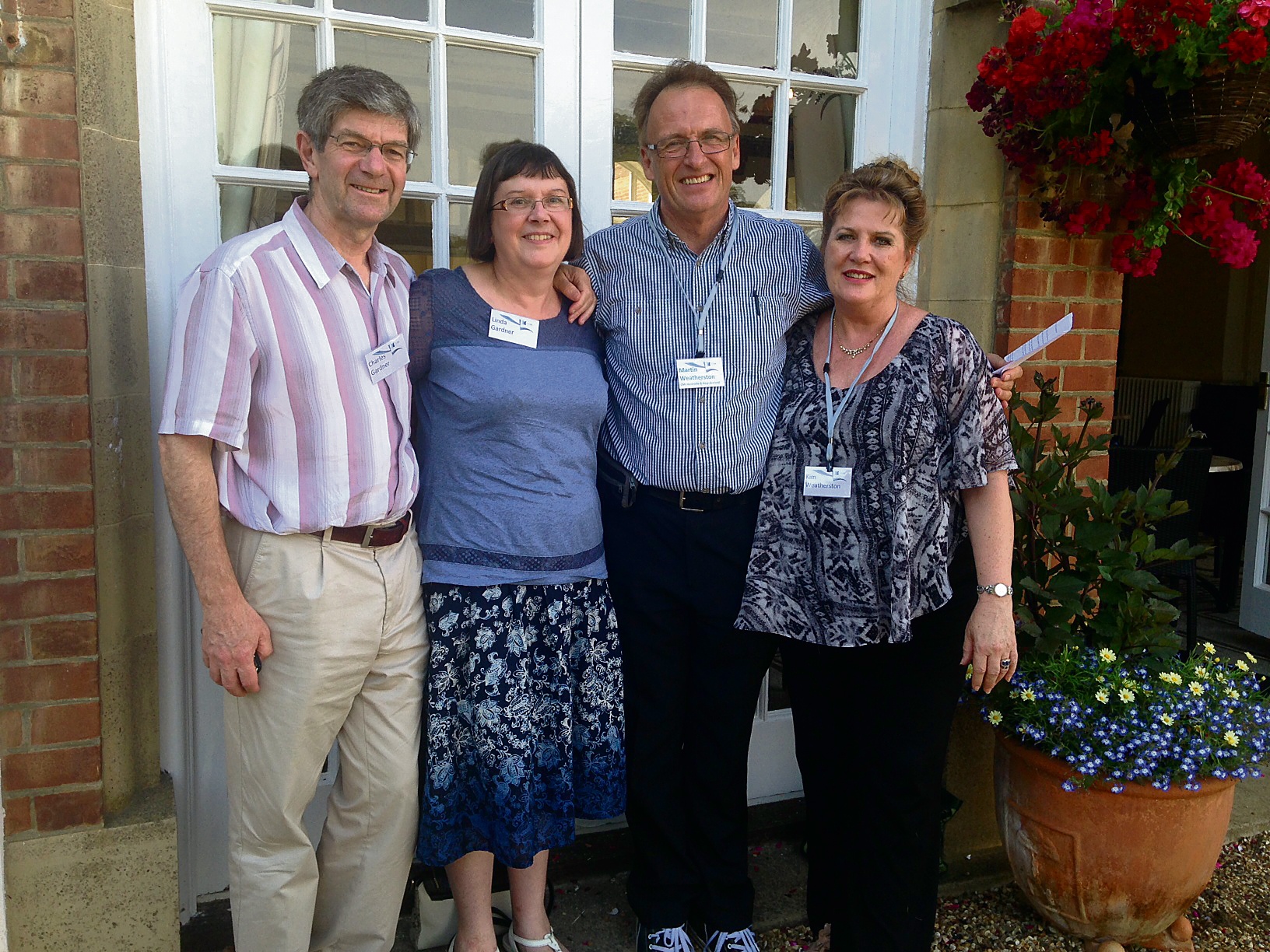 Charles Gardner and his wife with friends at a CMJ conference