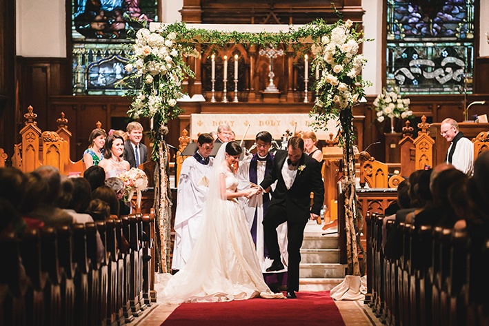MUTUAL CRUSH: Complete with the chuppah and glass-crushing, Nick and Betsy’s wedding incorporates at least two Jewish elements. The chuppah is the traditional canopy surrounding the couple as they complete the nuptial contract over a shared glass of wine and there are many interpretations of the glass-smashing, the best perhaps being that is represents the fragility of marriage – and of life itself – and is thus a reminder to treat the arrangement with the greatest care.