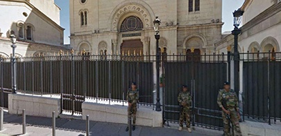 Armed guards standing outside Marseille Central Synagogue