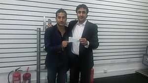 Wilson Chowdhry (left) gave a donor cheque to Nissar Hussain on behalf of the British Pakistan Christian Association. A few weeks later, he would be savagely beaten and end up in hospital with a broken hand and kneecap and extensive bruising. The attack was only stopped when a passer-by came to help Nissar