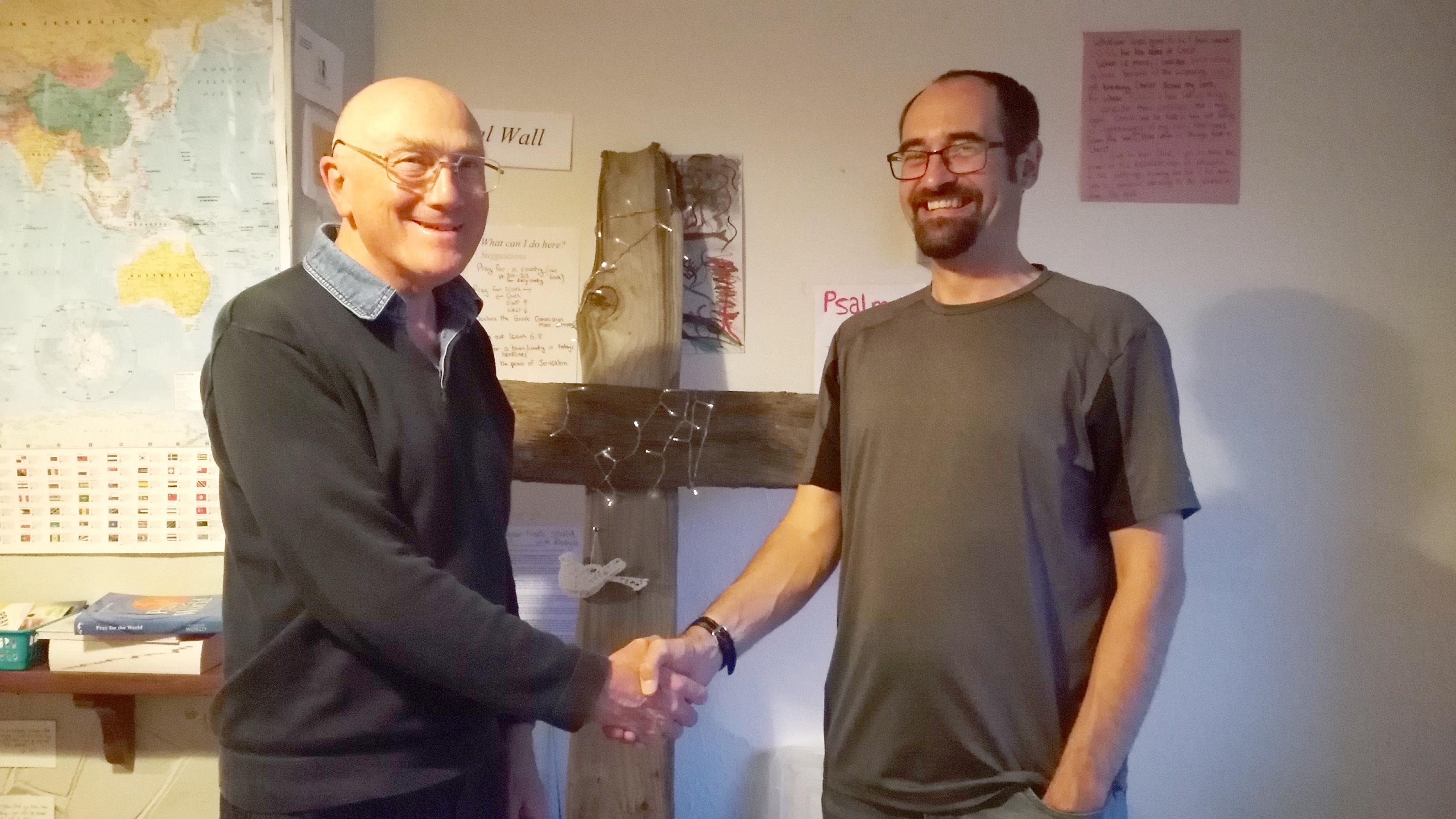 Pastor John France (left) has handed over to Ben Leney