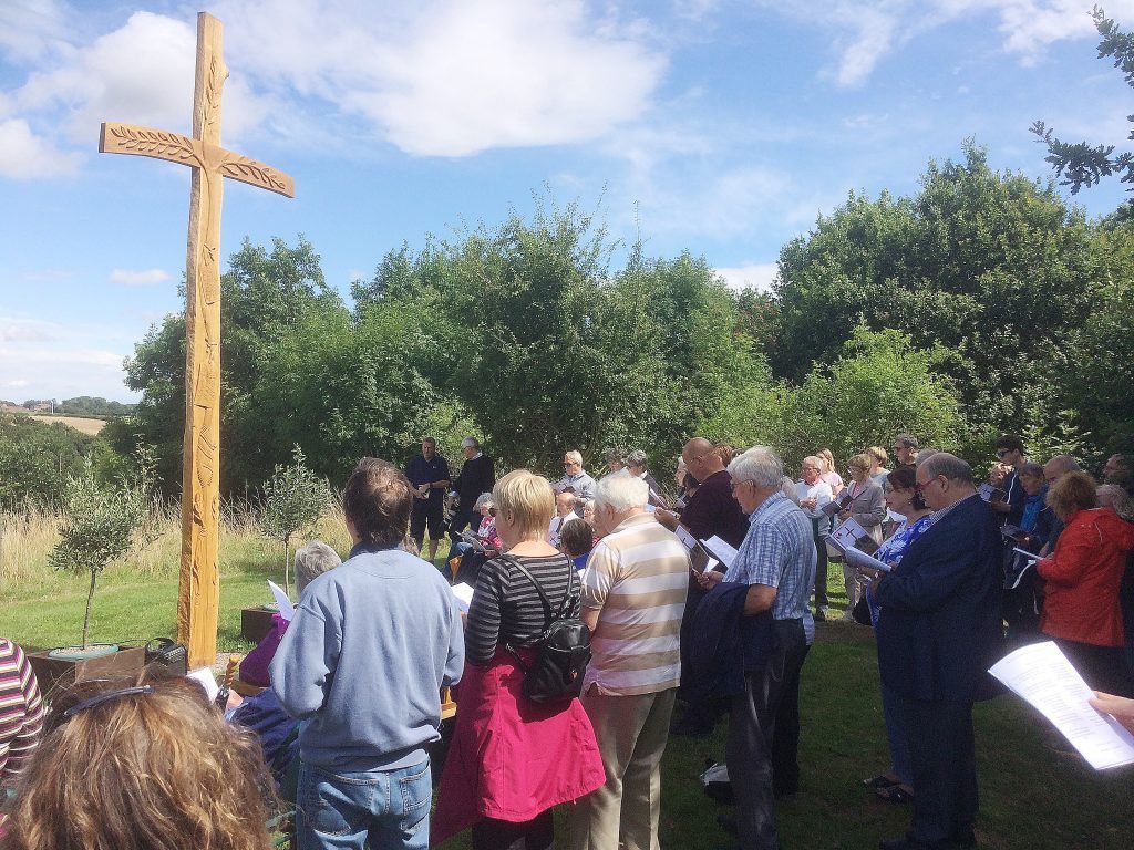 Worship at the cross’s dedication