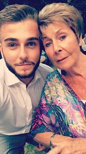 Iris (pictured with grandson Jake) paints prophetic pictures based on Scripture