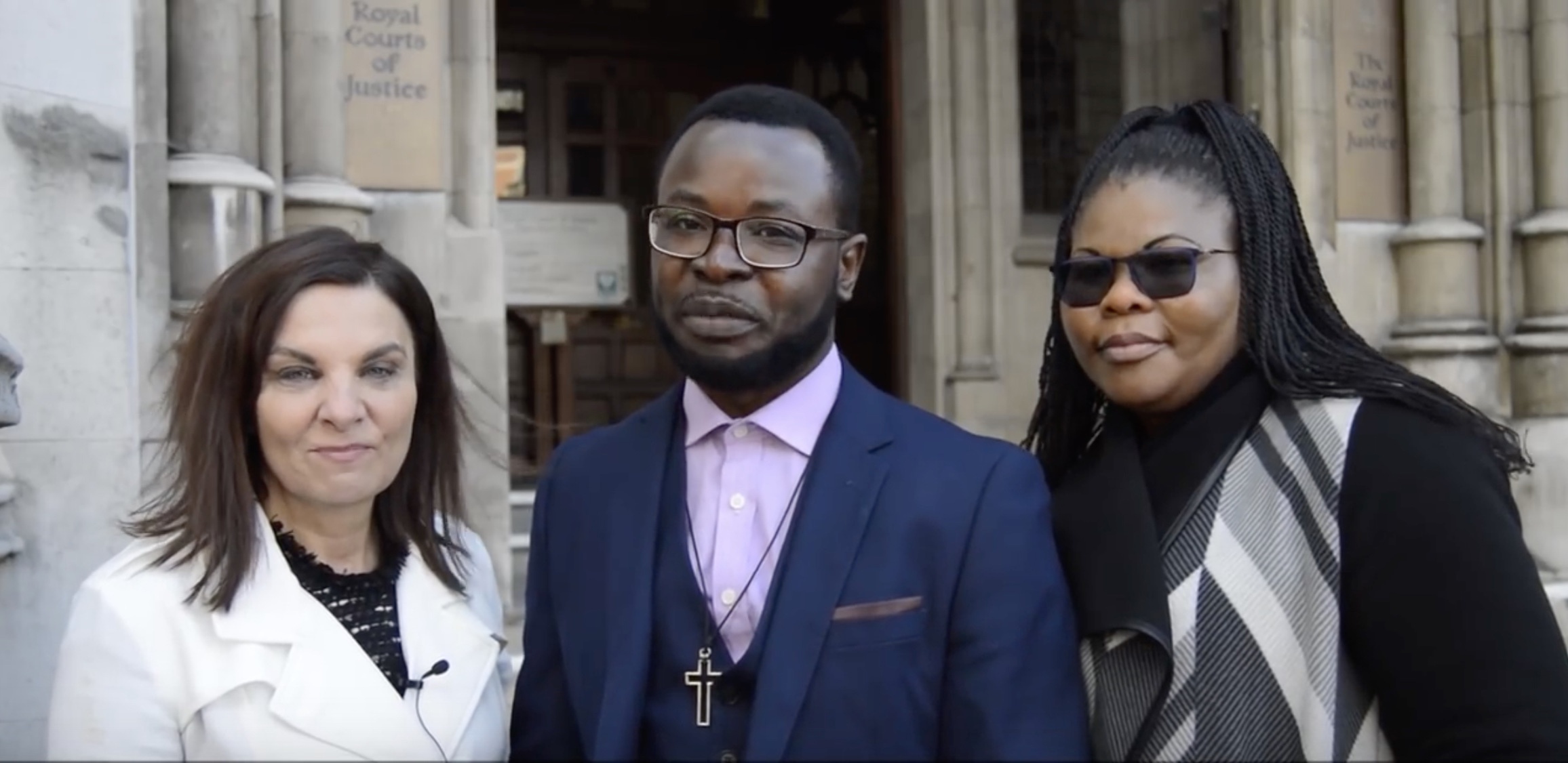 Felix and Pepsy Ngole with Andrea Williams at a 2017 court appearance