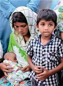 The wife of slain Amir Masih