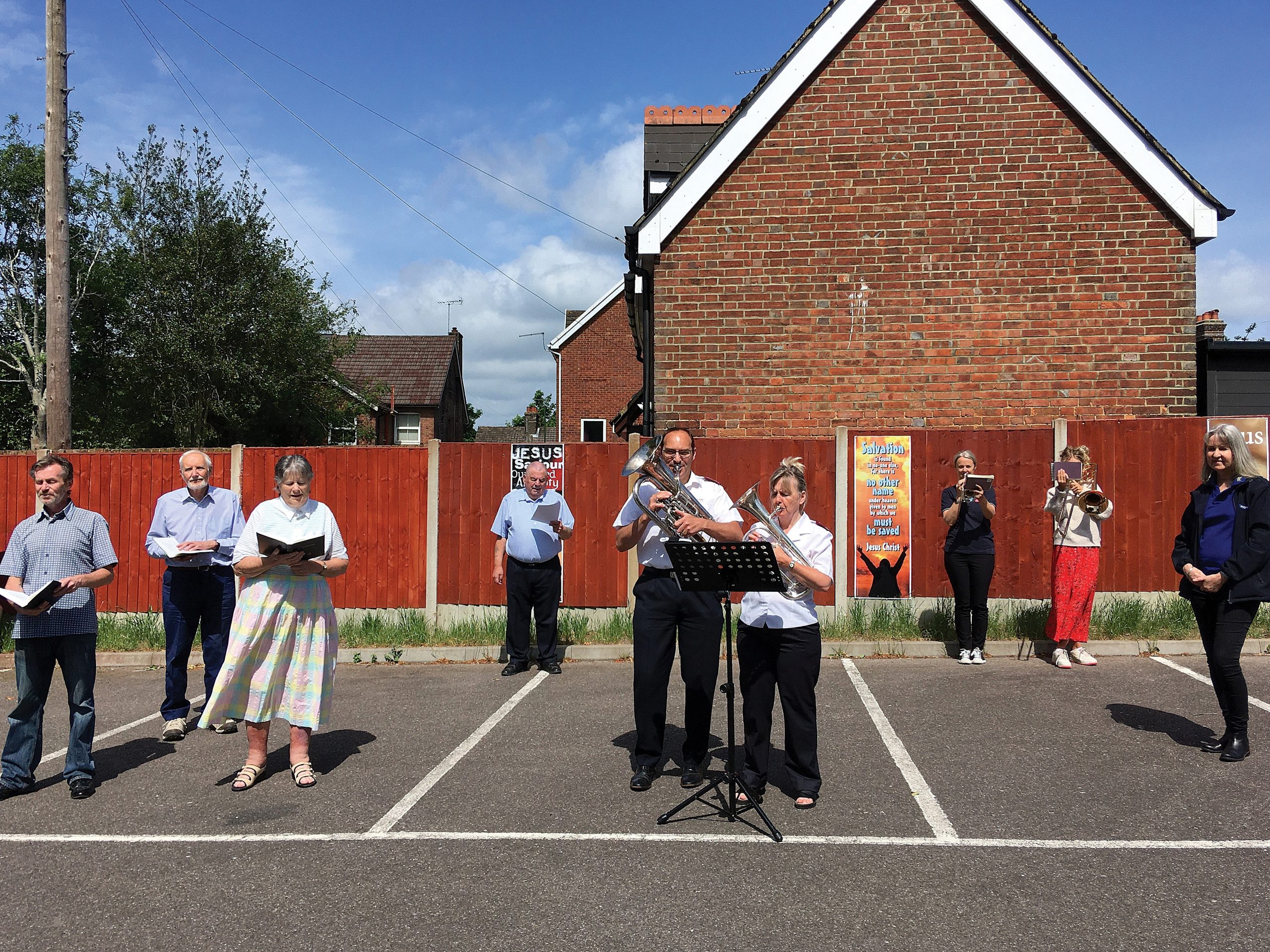 Salvation Army play hymns in the car park