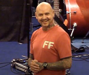 Graham speaking to a church gathering in 2014