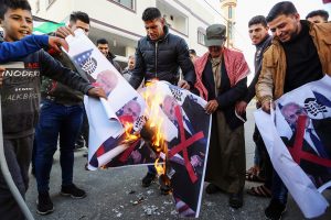 Palestinians burn pictures of Trump