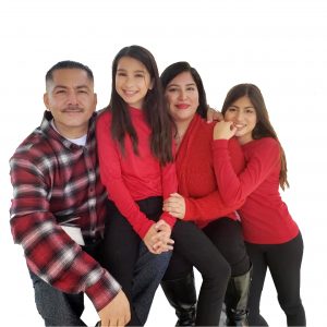Hannah with her husband Paul and daughters