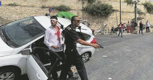 Rescued: an Israeli motorist was saved from a lynch mob in east Jerusalem