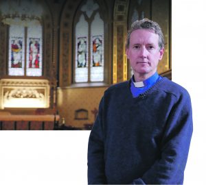 Rev Boyle is accused of hugging a mourner and putting out Bibles