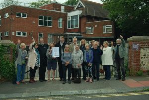 Vigil participants celebrating the clinic’s closure