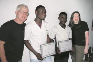 Optometrist Ian Squire and colleague Alanna Carson with the eye care team he trained