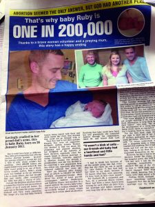 Newborn Ruby Thomas with delighted dad Richard