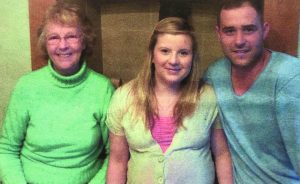 Pro-life activist Judy Law celebrating with parents to be Tara and Richard