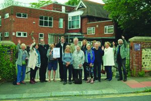 Vigil participants celebrating the clinic's closure