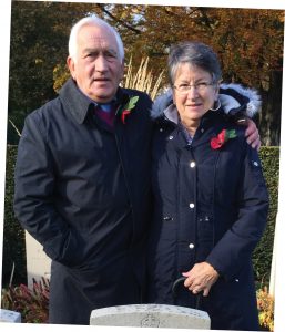 Richard Hatt pictured with his wife Angela at the grave of his father in Lenham, Kent in 2018
