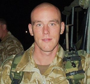 Shaven-headed Bruce in Iraq